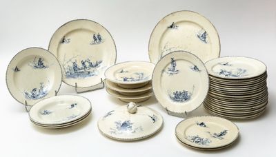 a lot of plates that are sitting on a table
