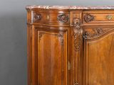 an antique french walnut sideboard with marble top