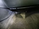 a close up of a car ' s floor with the door open