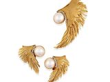 two pairs of gold earrings with pearls and fringes