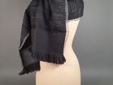 a black and white scarf on a mannequin mannequin mannequin mannequin mannequin mannequin mannequin mannequin mann