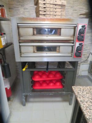 an image of a commercial pizza oven in a commercial kitchen