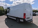 a white van that is parked in a parking lot