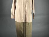 an image of a mannequin dressed in a khaki uniform