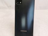 a close up of the back of a black samsung galaxy s20