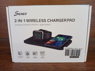 an image of a box with a phone and a charger on it