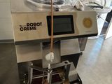 a machine that is sitting in the middle of a kitchen