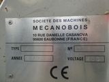 a picture of a machine that has a sign on it