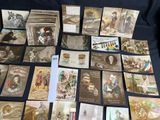 a lot of old postcards that are on the table
