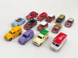 a lot of toy cars that are sitting on a table