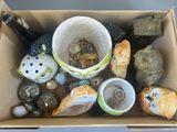 a box full of assorted items sitting on a table