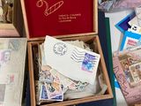 a box full of stamps sitting on top of a table