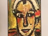 the front cover of a magazine with a painting of a woman ' s face