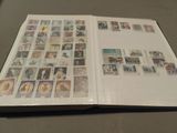 an open book with a lot of stamps on it