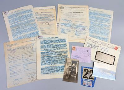some old papers are sitting on top of a table