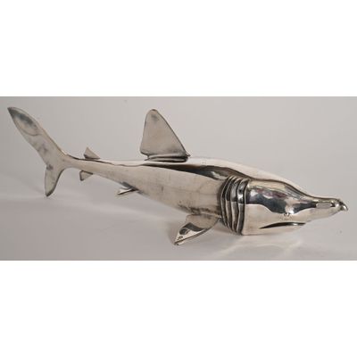 silver plated shark figurine with black and white stripes