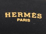hermes paris gold plated watch with black leather strap and black dial