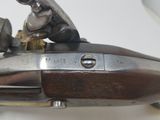 a close up of a gun on a table