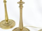 three candles that are sitting on a table