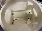 a picture of a toilet with the lid down