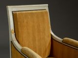 an upholstered chair with gold upholstered upholstered upholstered upholstered upholstered upholstered upholstered