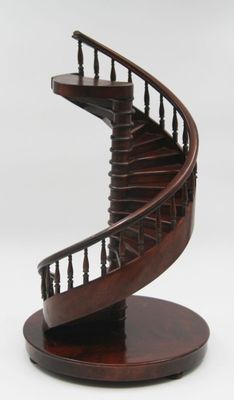 an image of a wooden spiral staircase on a stand