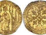 a gold coin with an image of a woman on it