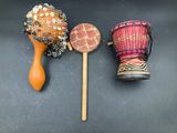 three different types of musical instruments on a black surface