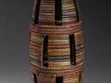 an image of a vase made of wood and glass