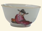 a white bowl with a picture of a man in a cowboy hat