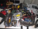 a table with a bunch of electronics on top of it
