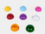 six different colored glass beads are arranged in a circle