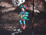 a picture of a painting of a boy playing cards