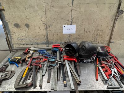 a lot of tools that are sitting on a table