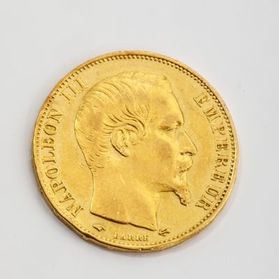 l'image d'une pièce d'or sur laquelle figure le visage d'une femme