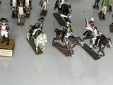 many figurines of soldiers on display on a table