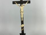black and gold crucifix with jesus on the cross