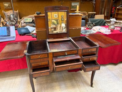 Coiffeuse en bois de placage marqueté découvrant un miroir, une tirett - Photo 1