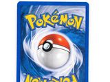 a close up of a card with a pokemon ball on it
