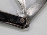 a close up of a pair of scissors on a table