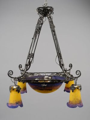 a close up of a chandelier hanging from a ceiling