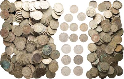 a lot of coins that are sitting on a table