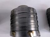 three different types of hose fittings sitting on a white surface