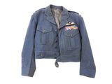 denim jacket with patches on the chest and collar