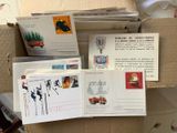 a box full of postcards sitting on top of a table
