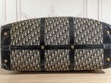 an image of a black and white bag on a table