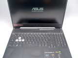 the asus laptop is open and ready to be used