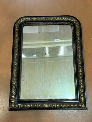 MIROIR de forme rectangulaire en bois mouluré, sculpté et do…