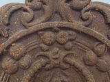 a statue of a woman with a crown on it ' s head