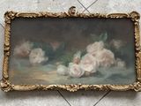 a picture of a painting of flowers on a tile floor